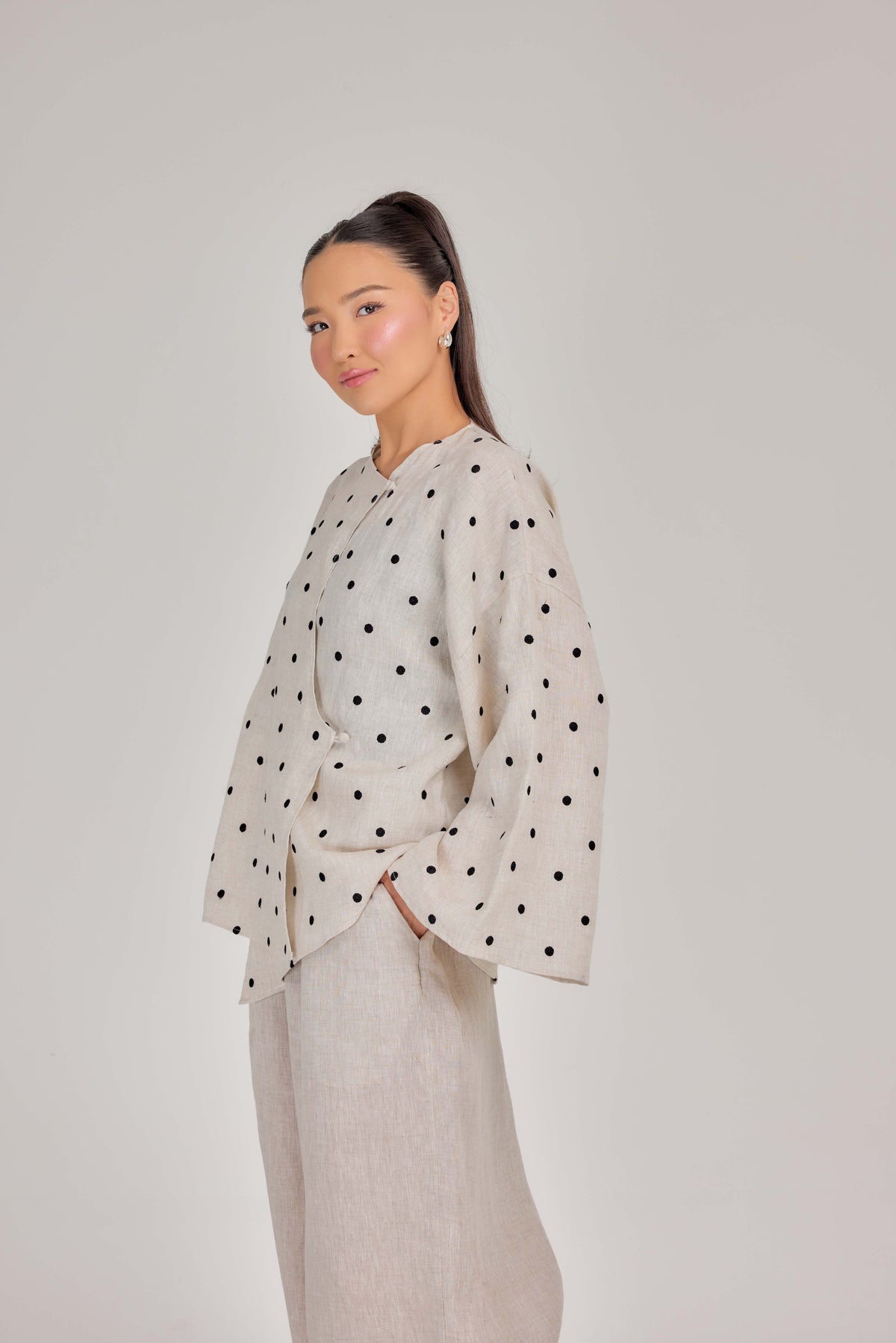 The Embroidered Polka Dot Pure Linen Wrap Top in Oatmeal & Onyx