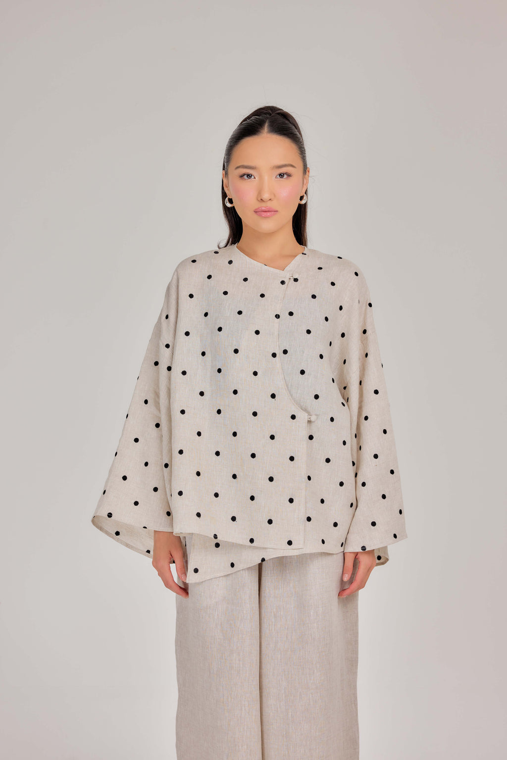 The Embroidered Polka Dot Pure Linen Wrap Top in Oatmeal & Onyx